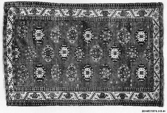 A Yomut main carpet built on alternating güls.